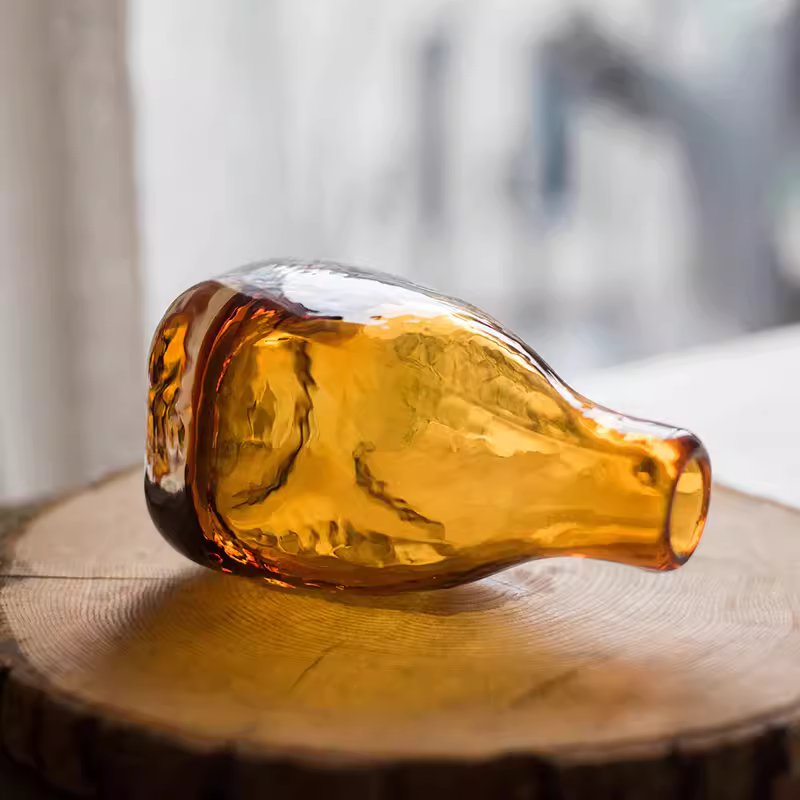 The Amber Hearth Glass Bottle